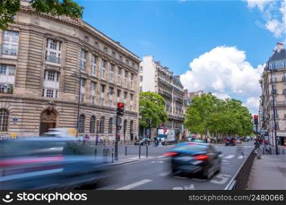 France. Paris. Street in the city center with traffic. Summer day. Paris Day Traffic on a Summer