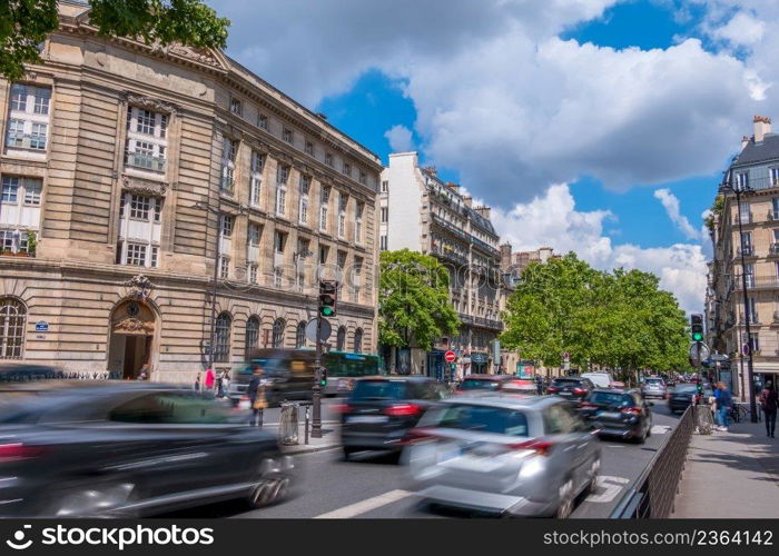 France. Paris. Street in the city center with traffic. Sunny summer day. Paris Sunny Day Traffic