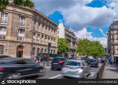 France. Paris. Street in the city center with traffic. Sunny summer day. Paris Sunny Day Traffic