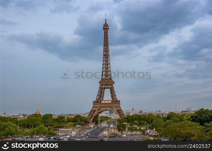 France. Paris. Summer cloudy evening. Traffic on the Jena Bridge near the Eiffel Tower. Evening Clouds over the Eiffel Tower
