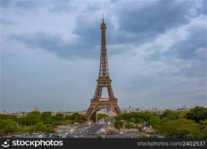 France. Paris. Summer cloudy evening. Traffic on the Jena Bridge near the Eiffel Tower. Evening Clouds over the Eiffel Tower