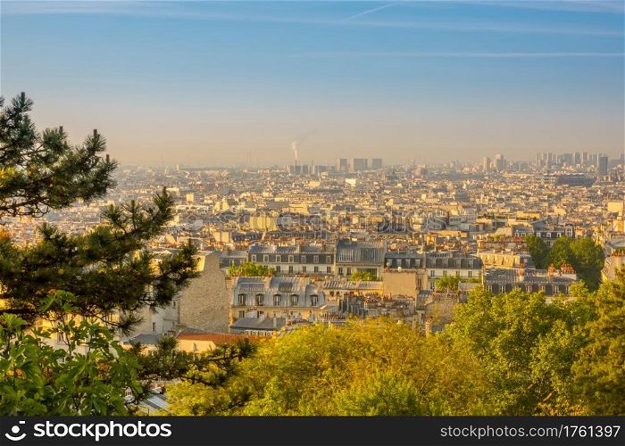 France. Paris. Summer sunny morning over the roofs. Morning Parisian Roofs