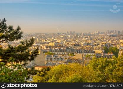 France. Paris. Summer sunny morning over the roofs. Morning Parisian Roofs