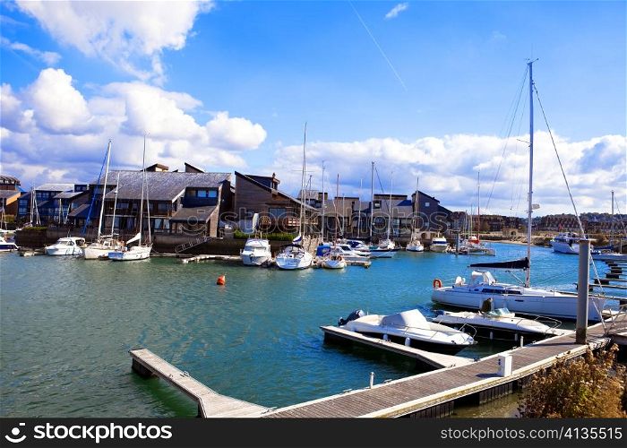 France, resort city Dovill. Boats in a bay before houses