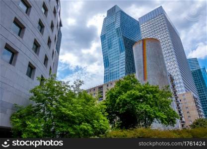 France. Summer Paris. Sunny day. Skyscrapers of La Defense. Parisian Skyscrapers La Defense and Clouds