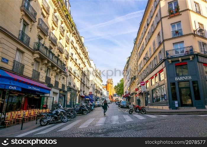 France. Sunny summer day on a street of Paris. Montmartre District. Summer Paris Street in the Montmartre District