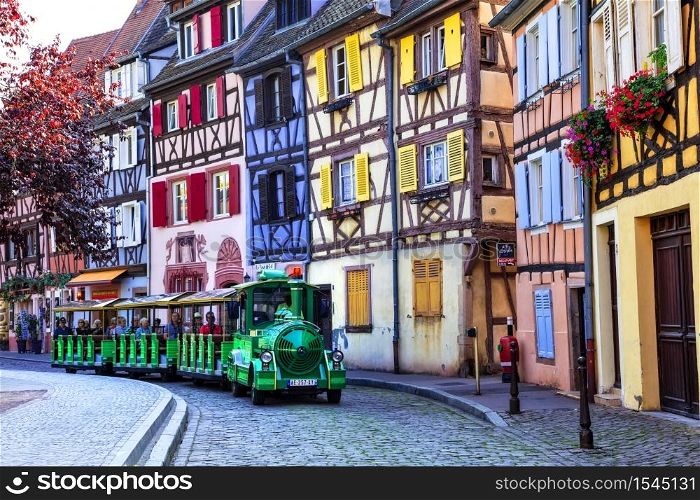 France travel. Most beautiful and colourful towns. Colmar in Alsace region. Tourist sightseeing train. September 2016. Travel and landmarks of France. Alsace region, Colmar town