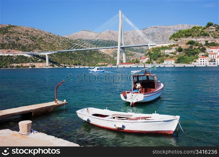 Franjo Tudjman Bridge at the entrance to Dubrovnik from western side in tranquil scenery of the Adriatic Sea coastline in Croatia, Dalmatia County