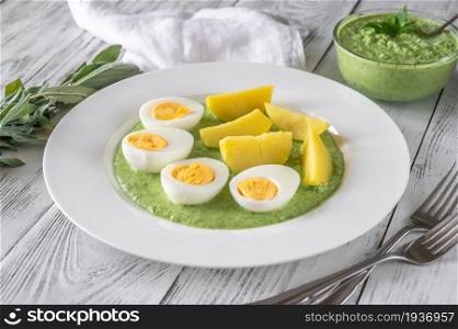 Frankfurt&rsquo;s Green Sauce garnished with boiled potatoes and eggs