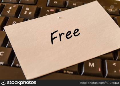 Free concept on black keyboard background