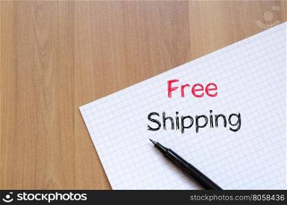 Free shipping text concept write on notebook