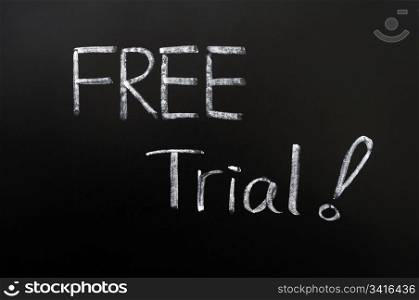 Free trial - words with a big exclamation mark written with chalk on a blackboard