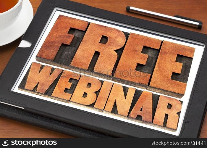 free webinar banner - internet communication concept - a word abstract in letterpress wood type printing blocks on a digital tablet