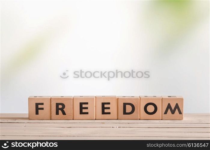 Freedom sign on a table in bright environment