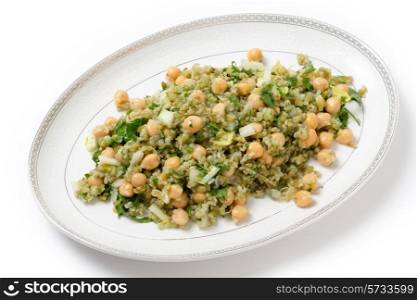 Freekeh salad with chickpeas, onion, parsley, celery, and a lemon juice and olive oil dressing