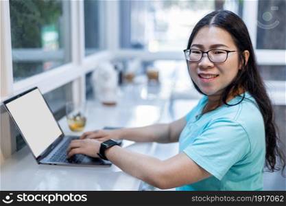 freelance people businessfemale wearing generic design smartwatch working with laptop computer and smartphone in at the cafe,Business Lifestyle communication concept