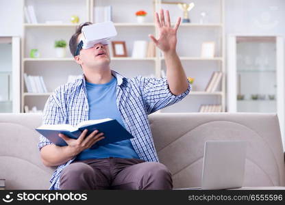 Freelance student with virtual reality glasses at home