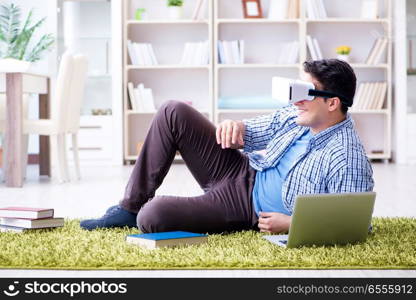 Freelance student with virtual reality glasses at home