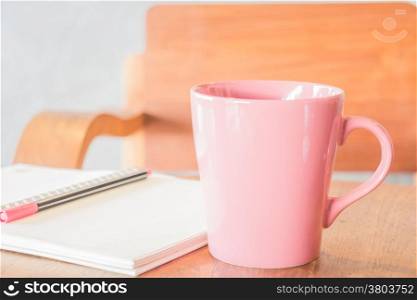 Freelance work table with notepaper and coffee, stock photo