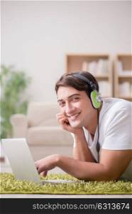 Freelancer working at home and listening to music