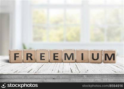 Freemium trend sign on a desk in a bright office with sunlight through the windows