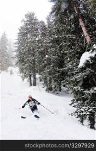 Freeride skier goes downhill in powder snow Mont Blanc Courmayeur Italy