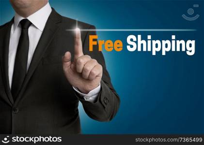 Freeshipping touchscreen is operated by businessman.. Freeshipping touchscreen is operated by businessman