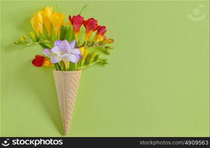 Freesias flowers in ice cream waffles