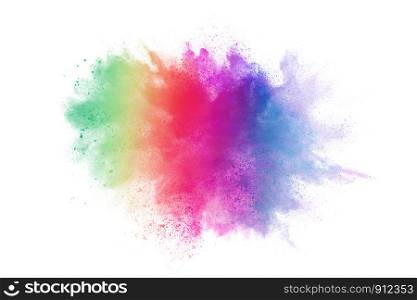 Freeze motion of colorful color powder exploding on white background. Paint Holi.