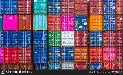 Freight shipping containers at the docks, Stack of containers in a container ship at deep sea port.