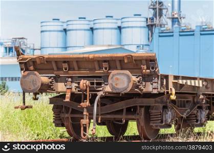 freight wagon rail, with the background of the silos