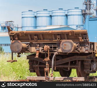 freight wagon rail, with the background of the silos