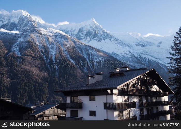 French alps mountain peaks covered with fresh snow. Winter landscape nature scene on beautiful sunny winter day.