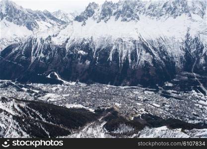 French alps mountain peaks covered with fresh snow. Winter landscape nature scene on beautiful sunny winter day.