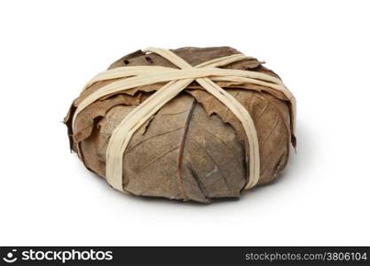 French Banon cheese in chestnut leaves on white background