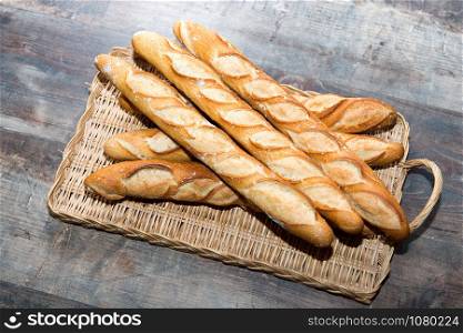 French bread stick on a rustic table