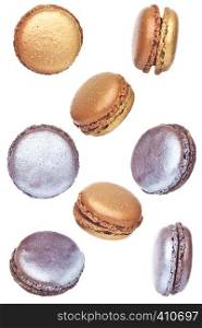 French brown and silver macarons dessert cakes top view isolated on white background