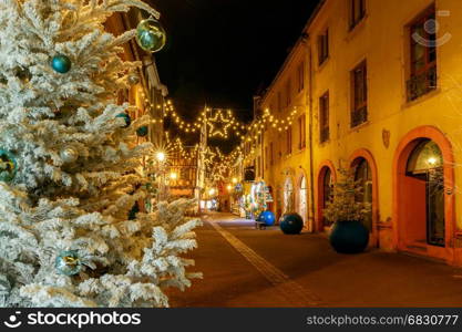 French city Colmar on Christmas Eve.. Traditional old half-timbered houses in the historic city of Colmar. Decorated and lighted during the Christmas season. Alsace. France.