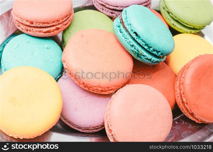 French Colorful Macarons on Pink Background