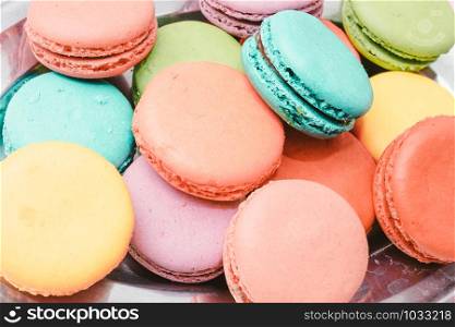 French Colorful Macarons on Pink Background