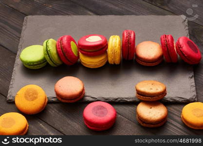 French delicious dessert macaroons on table