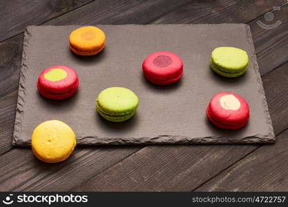 French delicious dessert macaroons on table