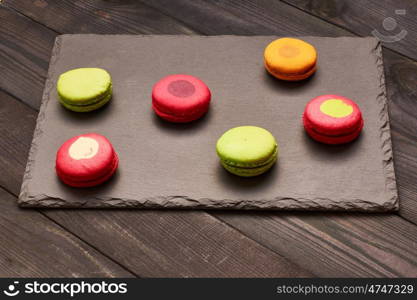 French delicious dessert macaroons on table