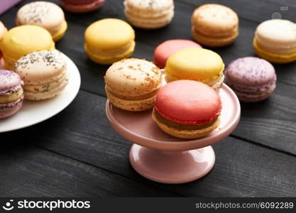 French delicious dessert macaroons on table