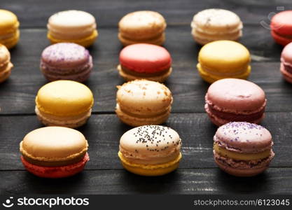 French delicious dessert macaroons on table