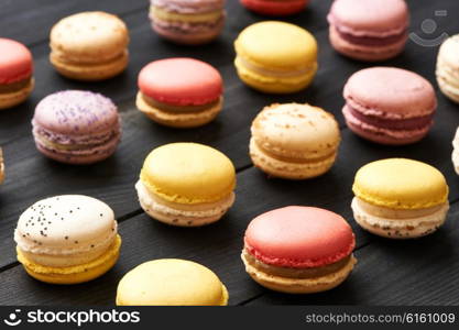 French delicious dessert macaroons on table