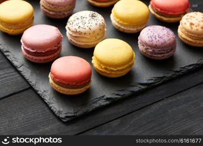 French delicious dessert macaroons on table