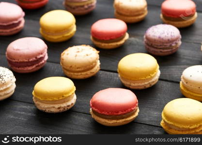 French delicious dessert macaroons on table