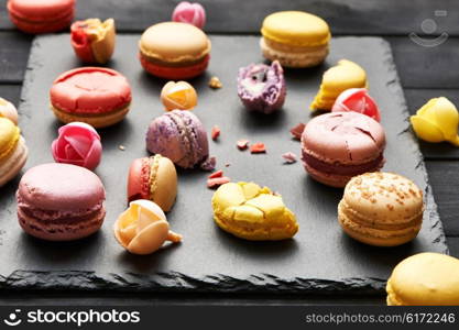 French delicious dessert macaroons on table