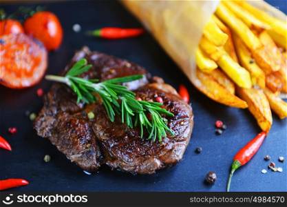 french fries and steak on plate